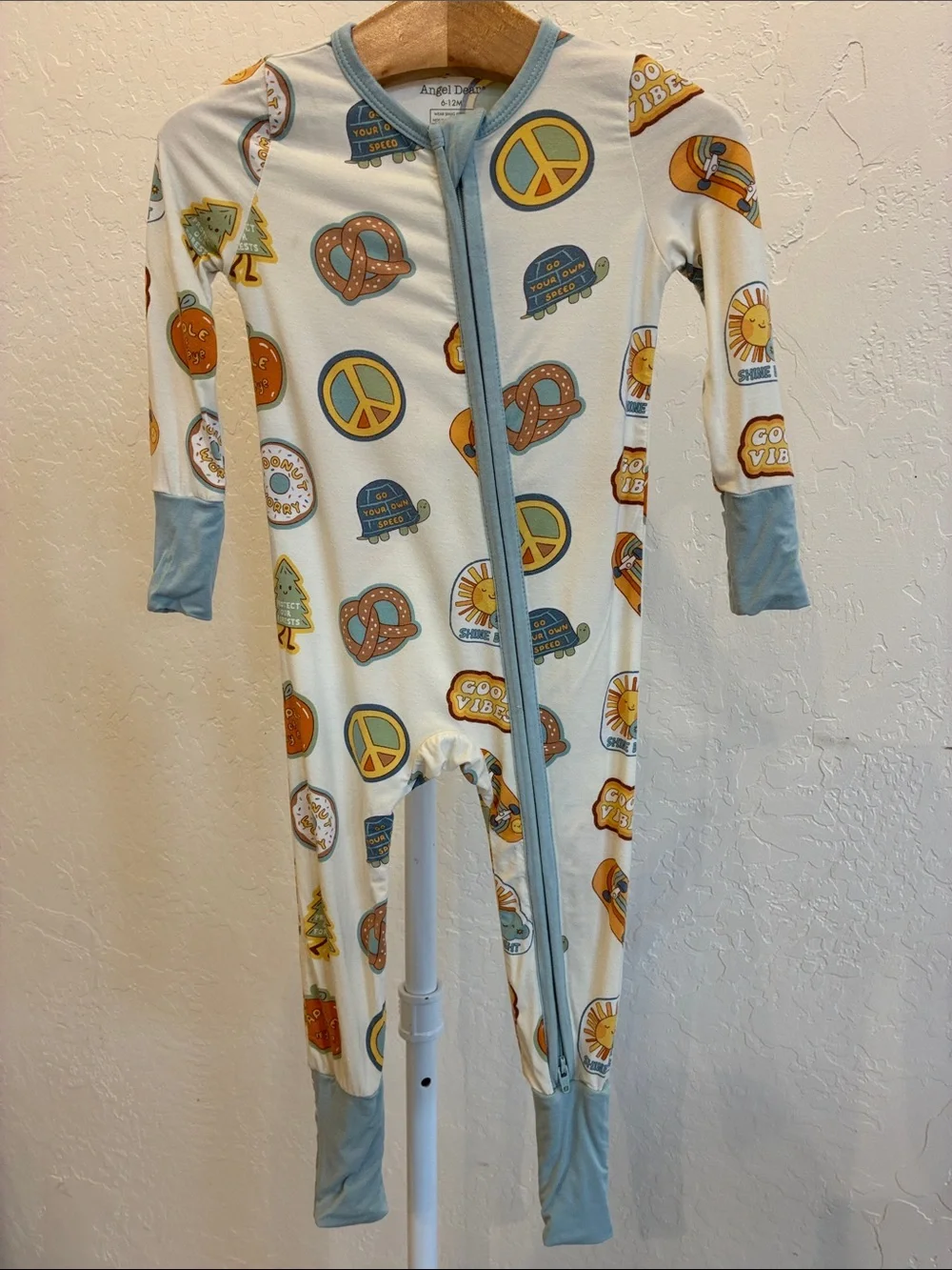 Angel Dear Cream One-Piece Footie Pajamas with Blue Trim and Yellow Accents